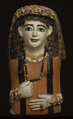 Mummy mask of a woman with a jeweled garland