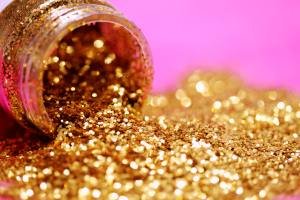 A bucket of gold glitter to represent autism acceptance.