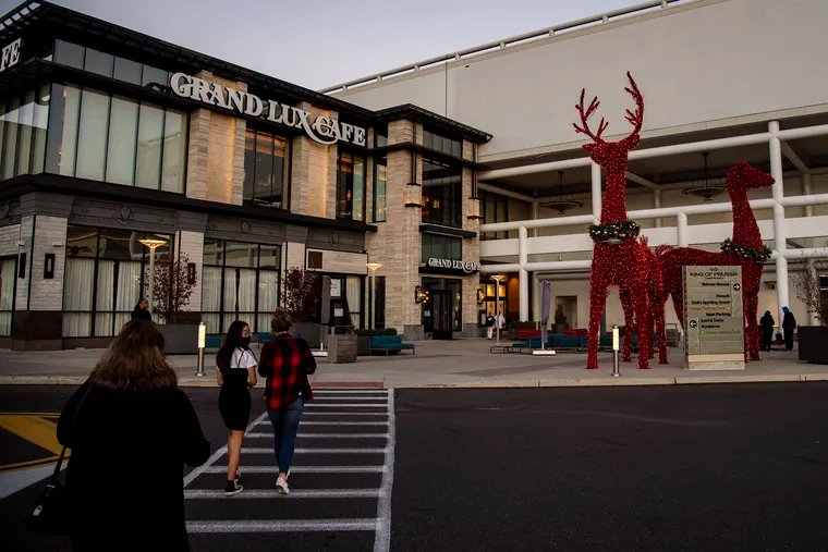 Customers make their way to the mall during black Friday sales at the King of Prussia Mall, In King of Prussia, Pa. Friday, November 27, 2020.