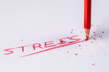 Image of the word stress with red pencil