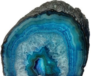 A geode with a boring, rough outside and a sparkling, bright blue inside.